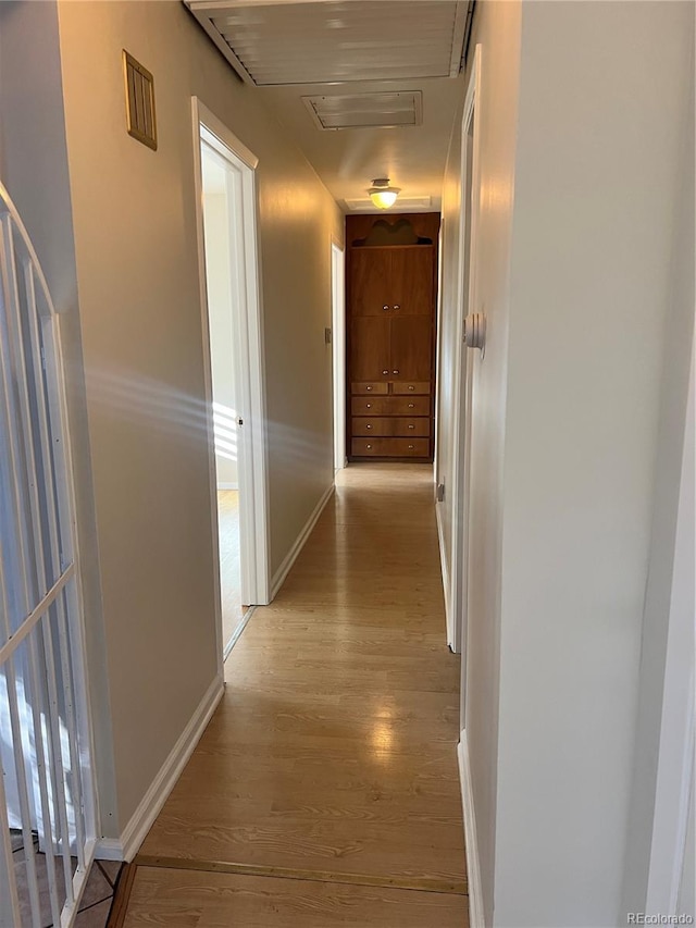 hall featuring light hardwood / wood-style flooring