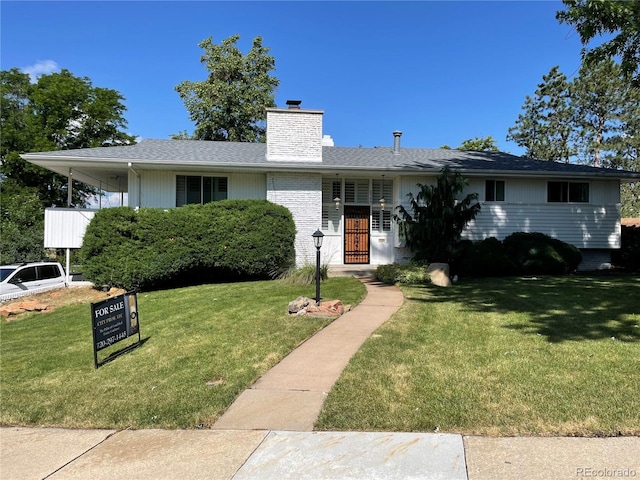 2789 S Ivan Way, Denver, CO 80227 - ranch-style house featuring a front lawn and a chimney