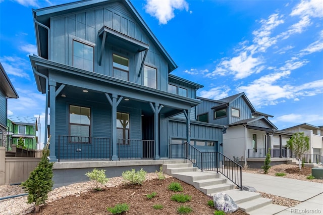 5608 Grandville Ave, Longmont, CO 80503 - view of front of house featuring a porch and board and batten siding