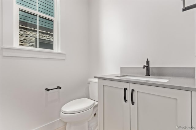 5608 Grandville Ave, Longmont, CO 80503 - bathroom with vanity and toilet
