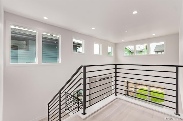 5608 Grandville Ave, Longmont, CO 80503 - stairway with recessed lighting and wood finished floors