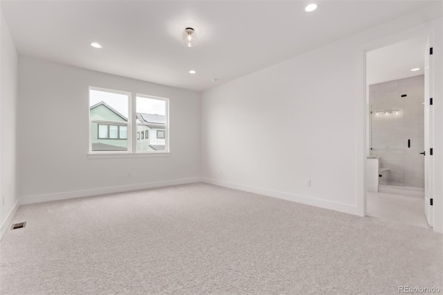 5608 Grandville Ave, Longmont, CO 80503 - empty room featuring light colored carpet and recessed lighting