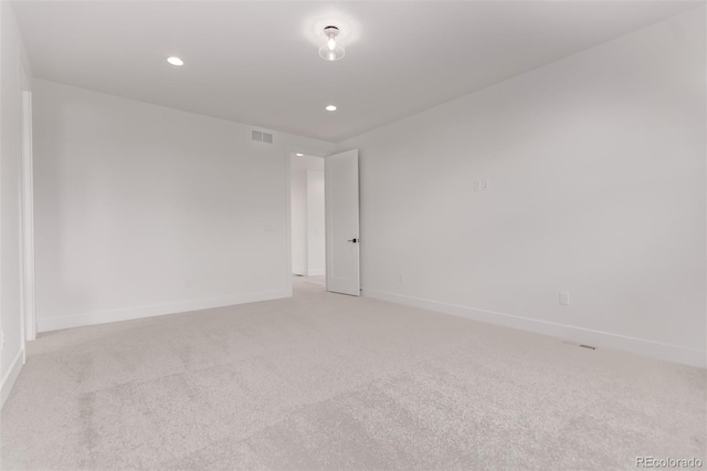 5608 Grandville Ave, Longmont, CO 80503 - spare room featuring light colored carpet and recessed lighting