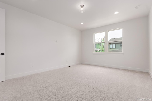 5608 Grandville Ave, Longmont, CO 80503 - unfurnished room featuring light carpet and recessed lighting