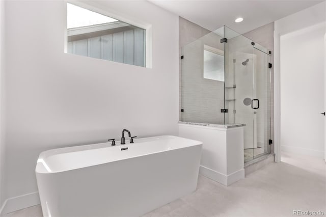5608 Grandville Ave, Longmont, CO 80503 - full bath featuring a soaking tub, a stall shower, and recessed lighting