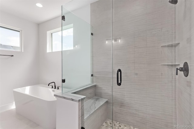 5608 Grandville Ave, Longmont, CO 80503 - bathroom with a shower stall and a freestanding bath