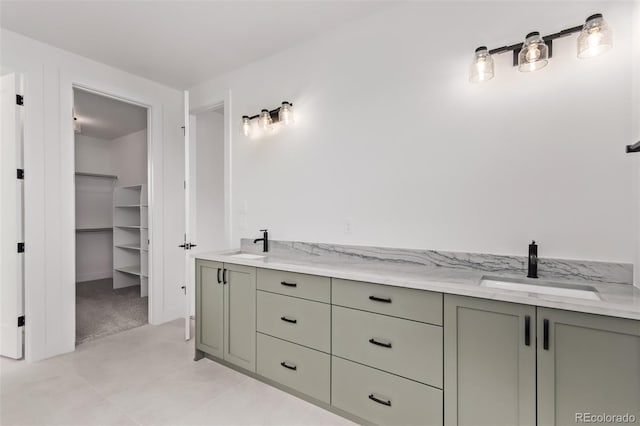 5608 Grandville Ave, Longmont, CO 80503 - full bathroom with double vanity and a walk in closet
