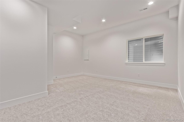 5608 Grandville Ave, Longmont, CO 80503 - empty room featuring light colored carpet and recessed lighting