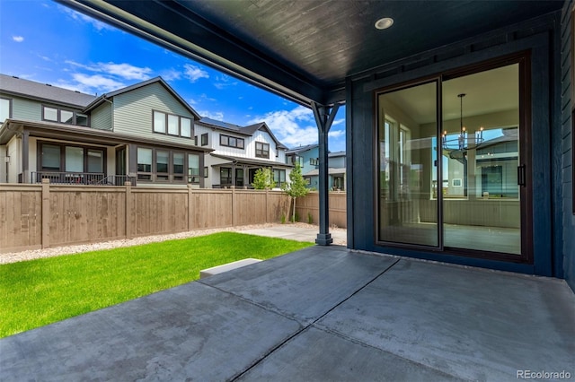 5608 Grandville Ave, Longmont, CO 80503 - fenced backyard with a patio