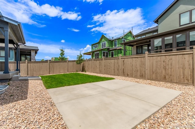 5608 Grandville Ave, Longmont, CO 80503 - fenced backyard featuring a patio area