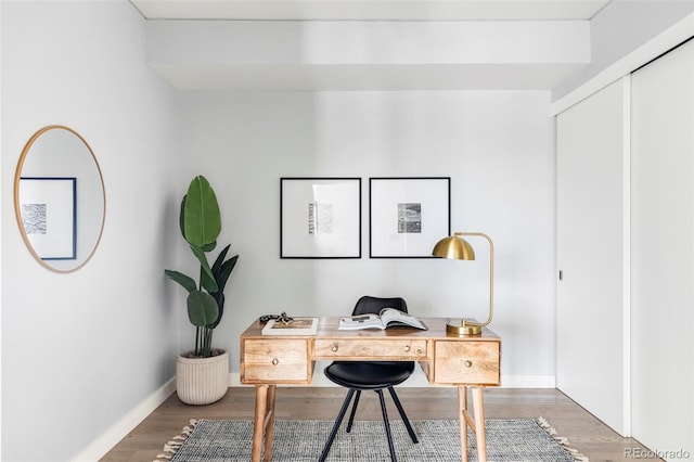 office with hardwood / wood-style flooring