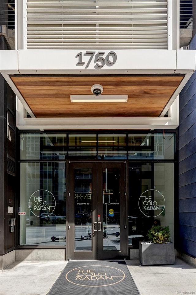 property entrance featuring french doors