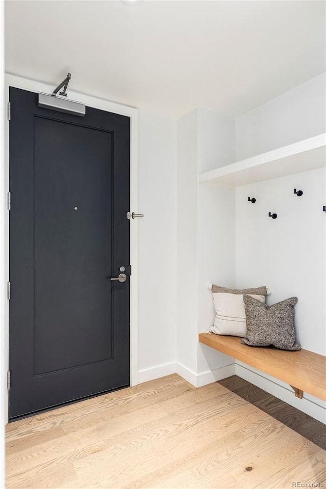 mudroom with light wood-type flooring