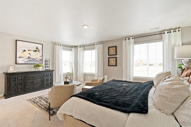 bedroom featuring carpet and visible vents