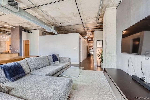 living room featuring visible vents