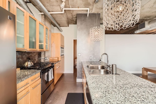 kitchen with decorative backsplash, glass insert cabinets, stainless steel appliances, light brown cabinets, and a sink