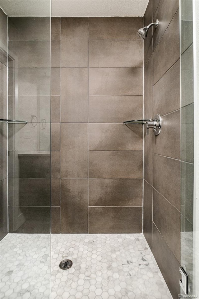 bathroom with a stall shower