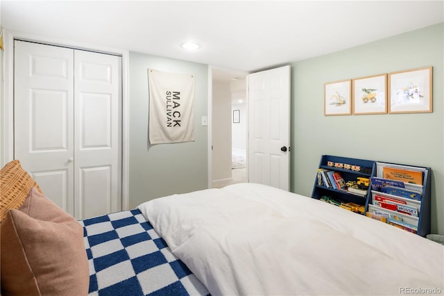 bedroom featuring a closet and recessed lighting