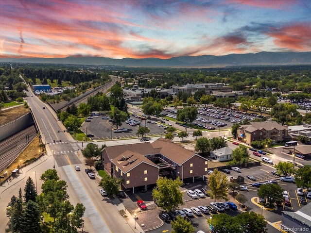 aerial view at dusk with a mountain view