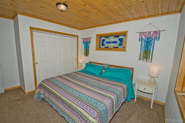 carpeted bedroom with wooden ceiling, crown molding, and a closet