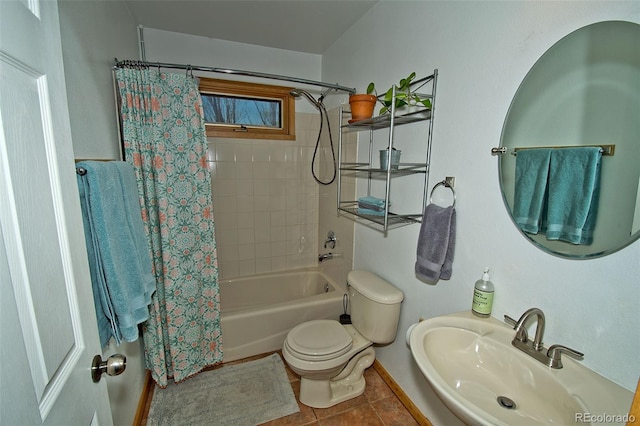 full bathroom with toilet, sink, shower / tub combo, and tile patterned flooring