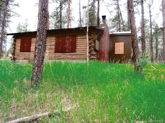 162 County Road-114, Bailey, CO 80421 - view of front facade with log siding