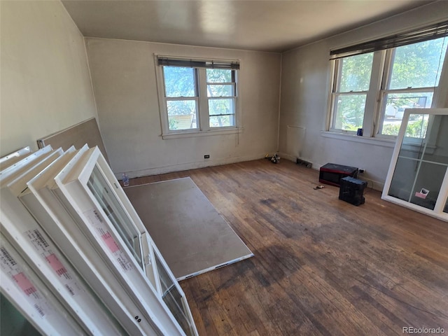 3350 S Eliot St, Englewood, CO 80110 - unfurnished room with wood finished floors