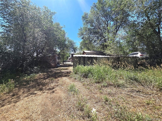 3350 S Eliot St, Englewood, CO 80110 - view of dirt / gravel driveway