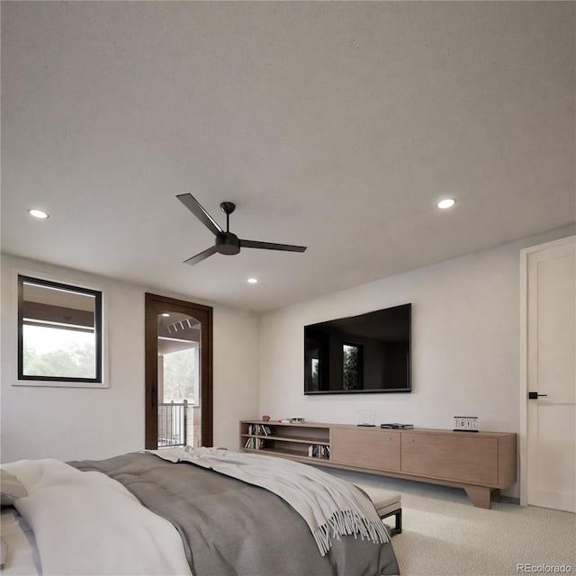 bedroom featuring ceiling fan and light colored carpet