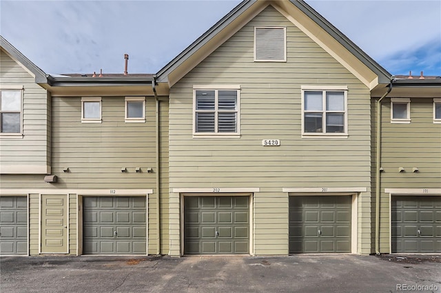 exterior space featuring an attached garage