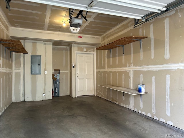 garage with electric panel and a garage door opener