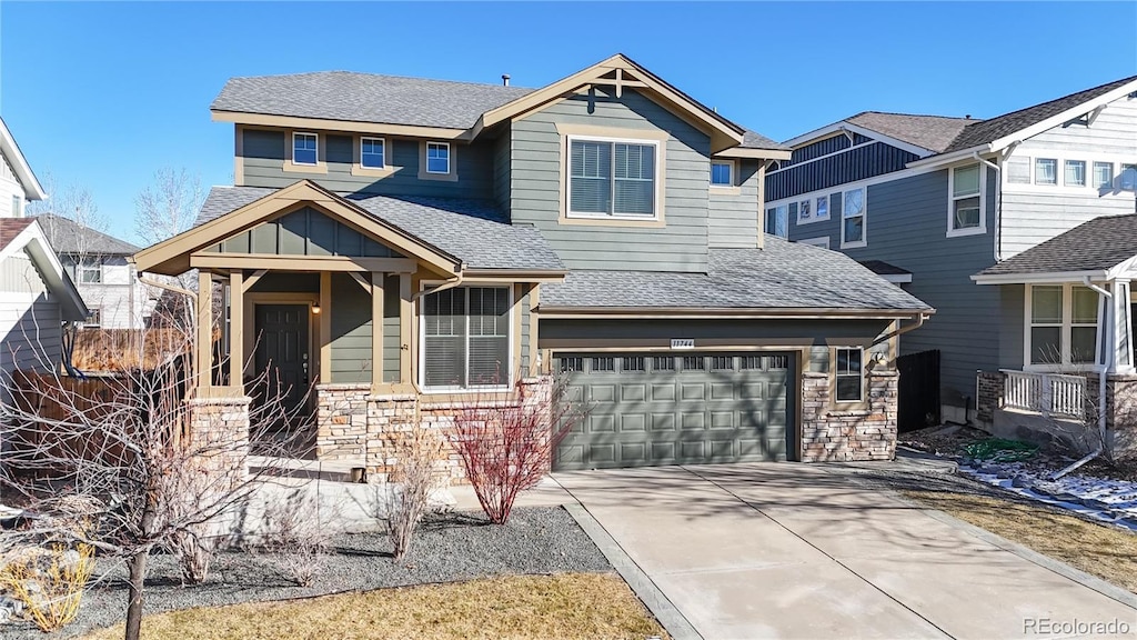 craftsman house featuring a garage