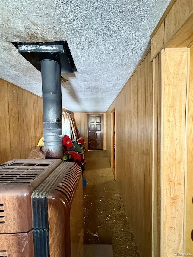 1245 Winchester Dr, Como, CO 80432 - detailed view of wooden walls, a textured ceiling, and carpet