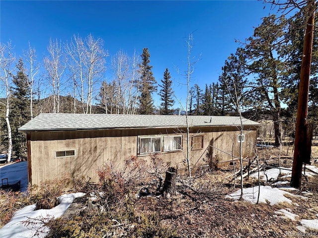 1245 Winchester Dr, Como, CO 80432 - view of side of property featuring roof with shingles and a mountain view
