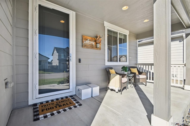 property entrance featuring covered porch