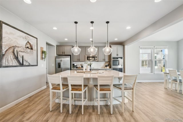 dining room featuring light hardwood / wood-style floors