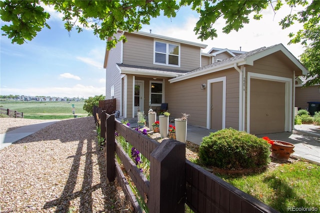 2296 E 109th Dr, Northglenn, CO 80233 - traditional-style house with a garage