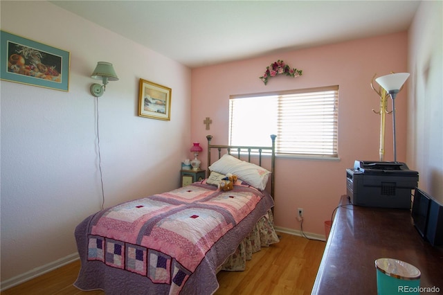 2296 E 109th Dr, Northglenn, CO 80233 - bedroom with wood finished floors and baseboards