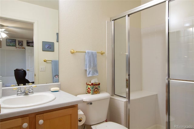 2296 E 109th Dr, Northglenn, CO 80233 - bathroom with toilet, vanity, a shower stall, and ceiling fan