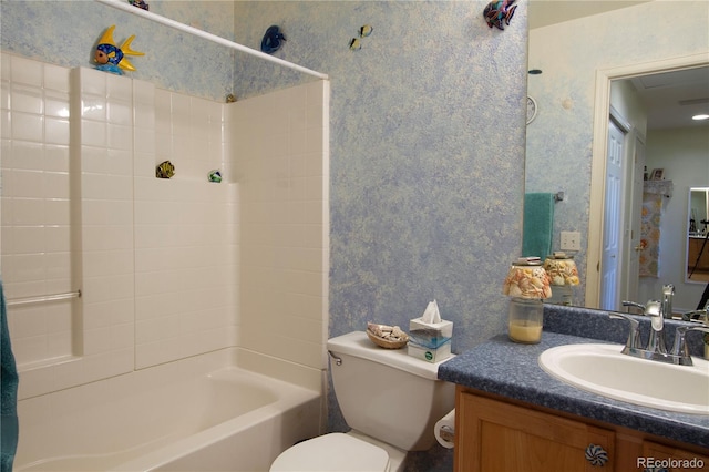 2296 E 109th Dr, Northglenn, CO 80233 - full bath featuring wallpapered walls, toilet, vanity, and bathtub / shower combination