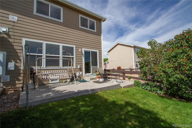 2296 E 109th Dr, Northglenn, CO 80233 - rear view of house with a patio
