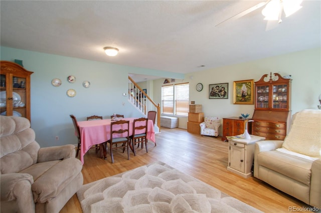 2296 E 109th Dr, Northglenn, CO 80233 - dining room with stairs, light wood-type flooring, and a ceiling fan