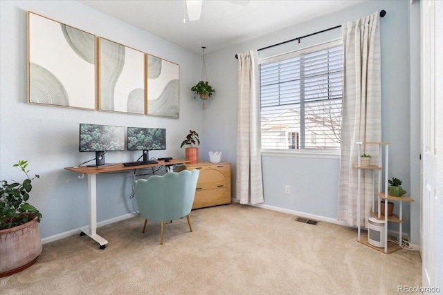 carpeted office with ceiling fan