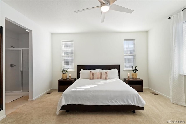 bedroom with light colored carpet and ceiling fan