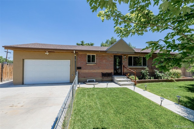 9170 Aspen Dr, Thornton, CO 80229 - single story home featuring concrete driveway, a garage, brick siding, and stucco siding