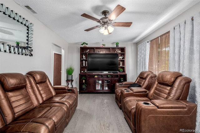 9170 Aspen Dr, Thornton, CO 80229 - living area featuring wood finished floors and ceiling fan