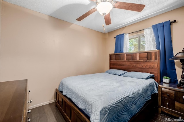9170 Aspen Dr, Thornton, CO 80229 - bedroom featuring wood finished floors, a textured ceiling, and ceiling fan