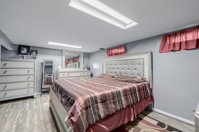 9170 Aspen Dr, Thornton, CO 80229 - bedroom with wood finished floors and baseboards