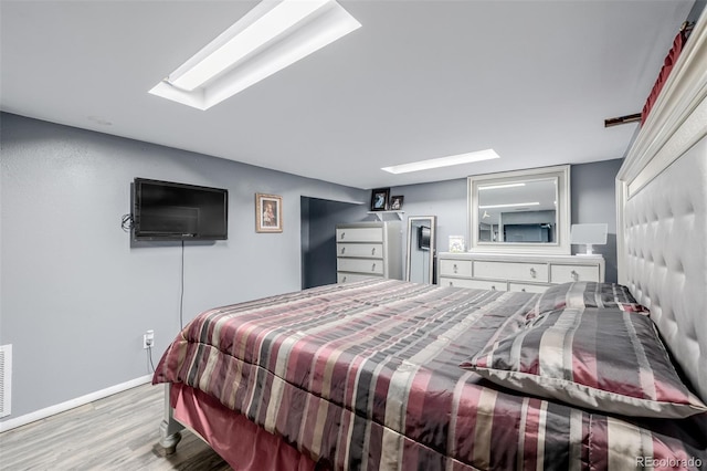 9170 Aspen Dr, Thornton, CO 80229 - bedroom featuring wood finished floors and baseboards