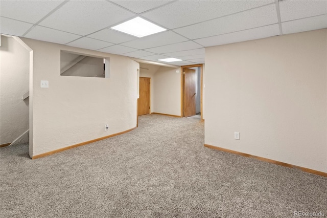 1400 S Knox Ct, Denver, CO 80219 - finished below grade area featuring a drop ceiling, carpet, and baseboards